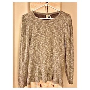 Peplum style light sweater top